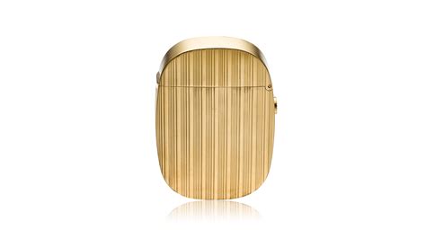 Solid Gold Vintage Patek Philippe Ellipse Lighter .